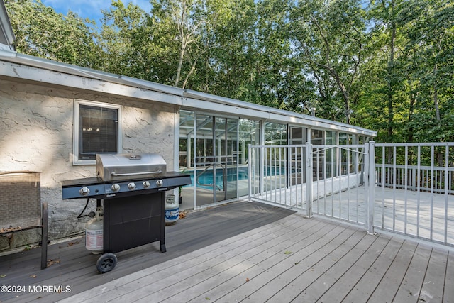 222 Bartley Rd, Jackson, NJ 08527 - deck with an outdoor pool, grilling area, and a sunroom