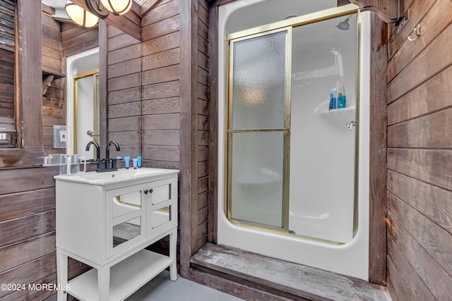 222 Bartley Rd, Jackson, NJ 08527 - bathroom with wood walls, a shower stall, and vanity