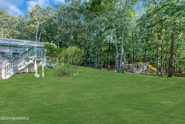 222 Bartley Rd, Jackson, NJ 08527 - view of green lawn with a playground and stairway