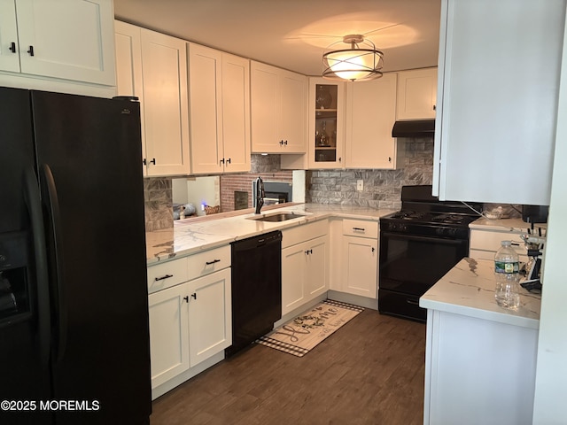 181 E Pleasant Grove Rd, Jackson, NJ 08527 - kitchen with black appliances, white cabinetry, backsplash, and light stone counters