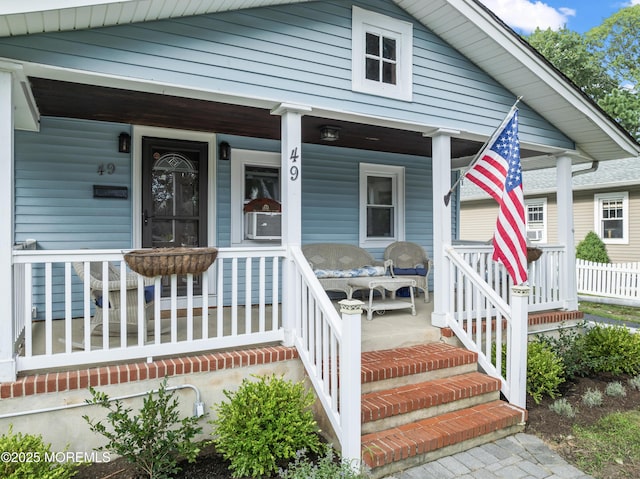 49 Highland Ave, Leonardo, NJ 07737 - view of front facade featuring a porch