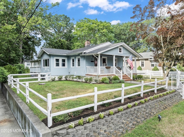 49 Highland Ave, Leonardo, NJ 07737 - ranch-style house featuring covered porch, a front lawn, a chimney, and a shingled roof