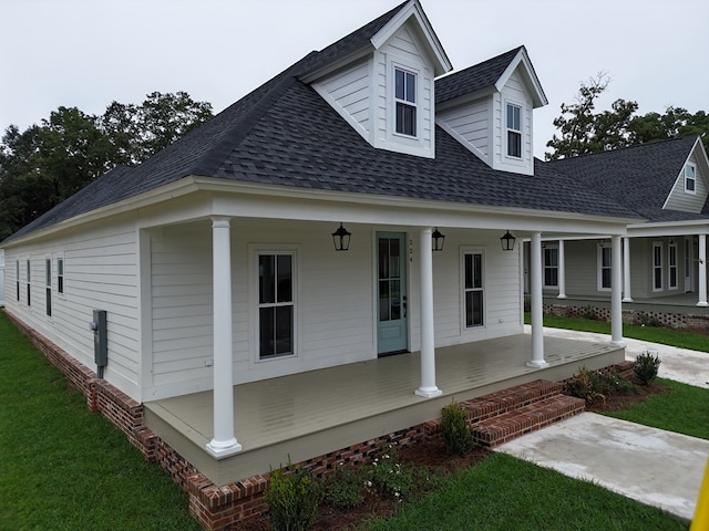 view of front of property featuring covered porch