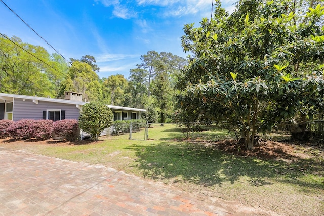 view of yard featuring fence