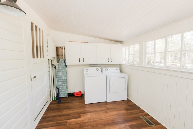 clothes washing area with visible vents, cabinet space, dark wood-style flooring, wood ceiling, and independent washer and dryer