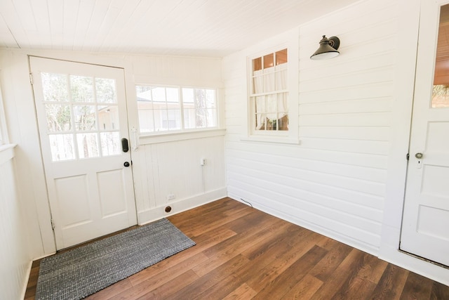 doorway featuring wood ceiling and dark wood-style flooring