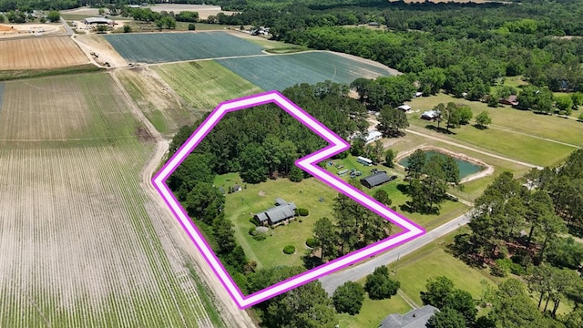aerial view of sparsely populated area featuring property parcel outlined