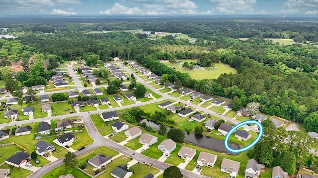 314 Grove Pointe Dr, Thomasville, GA 31792 - aerial view of property's location with a heavily wooded area and nearby suburban area