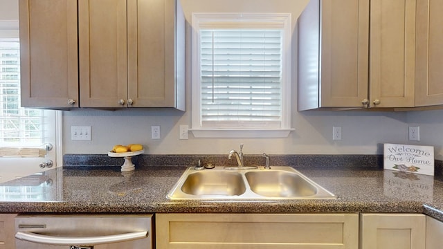 314 Grove Pointe Dr, Thomasville, GA 31792 - kitchen featuring dishwasher, a sink, and dark countertops