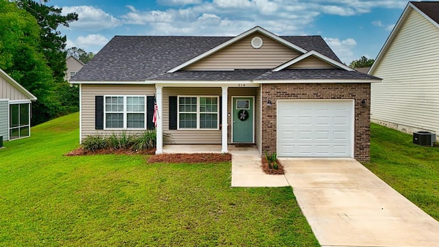 314 Grove Pointe Dr, Thomasville, GA 31792 - traditional home with a shingled roof, covered porch, concrete driveway, a garage, and a front yard