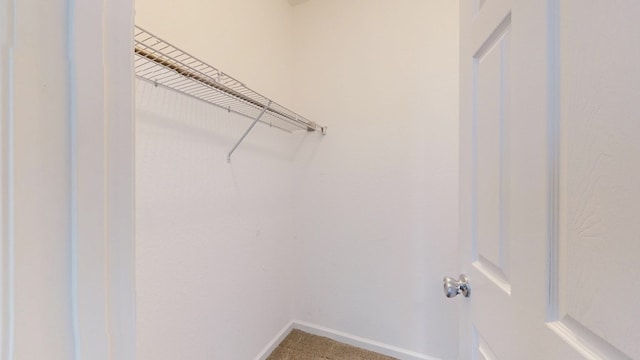314 Grove Pointe Dr, Thomasville, GA 31792 - walk in closet featuring carpet