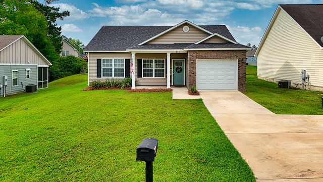 314 Grove Pointe Dr, Thomasville, GA 31792 - traditional-style house with central AC unit, roof with shingles, concrete driveway, and a front yard
