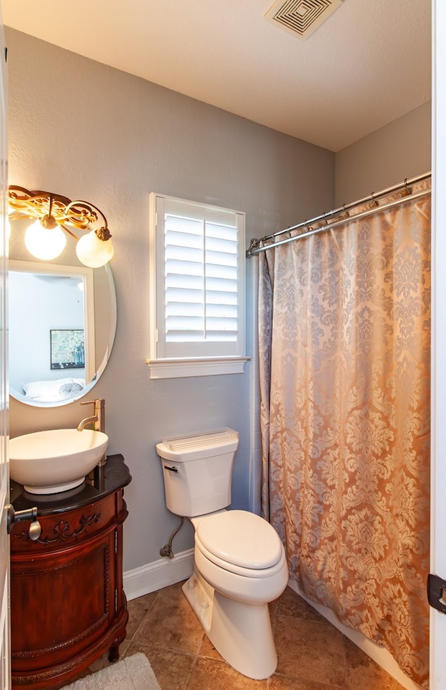110 Quail Rdg, Ochlocknee, GA 31773 - full bath with vanity, tile patterned flooring, and curtained shower