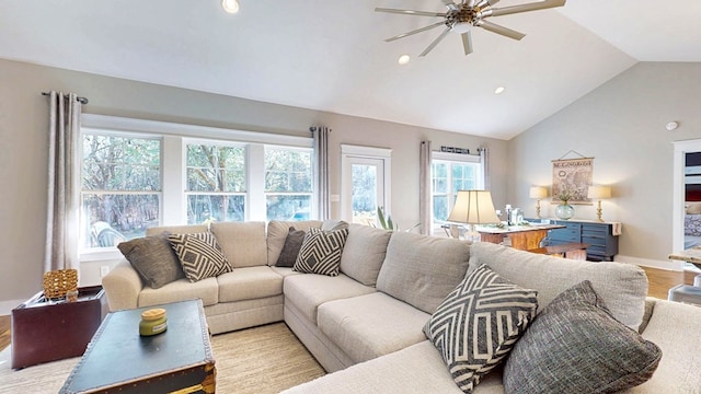 living room with wood finished floors, a ceiling fan, baseboards, lofted ceiling, and recessed lighting