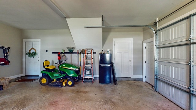 garage featuring baseboards