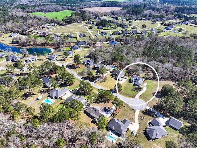 aerial view with a residential view and a water view