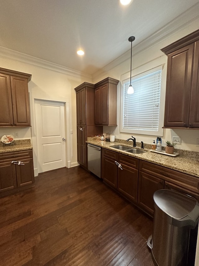 kitchen featuring dark hardwood / wood-style floors, pendant lighting, sink, stainless steel dishwasher, and crown molding