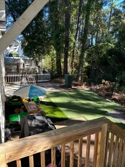 view of yard with a wooden deck