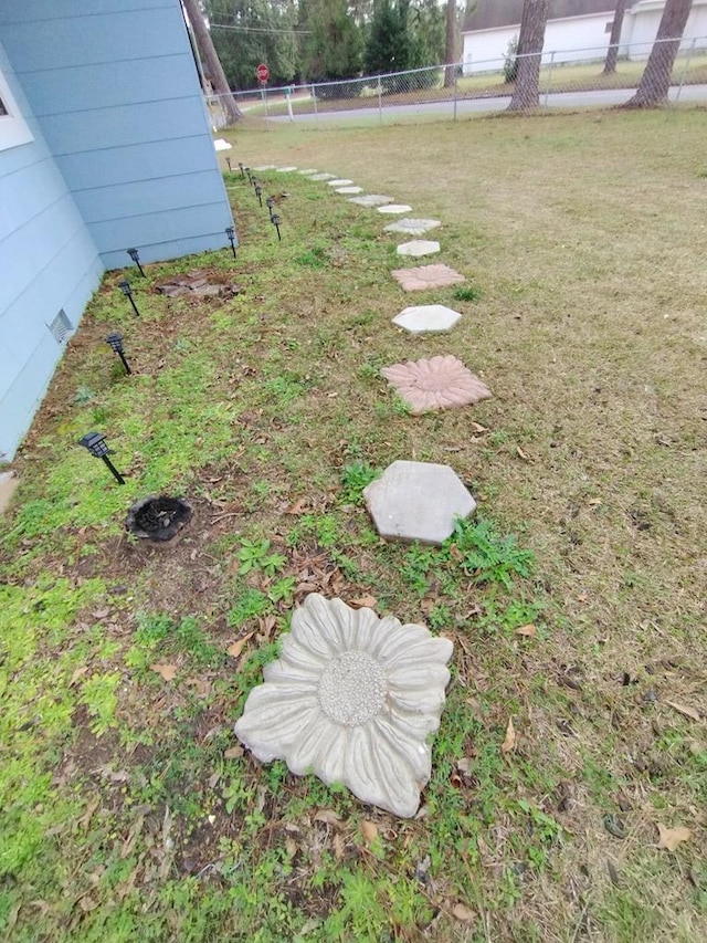 view of yard with fence