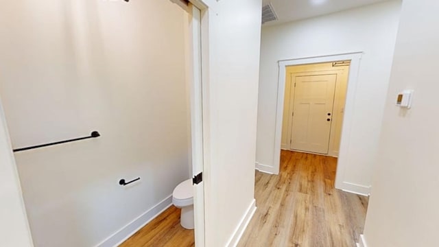 hallway featuring light hardwood / wood-style floors