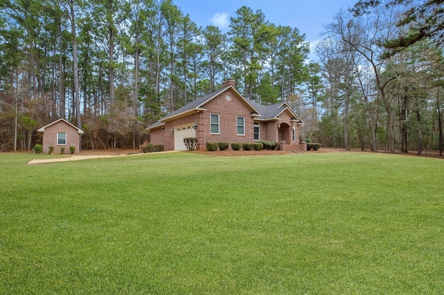 ranch-style home with a garage and a front yard