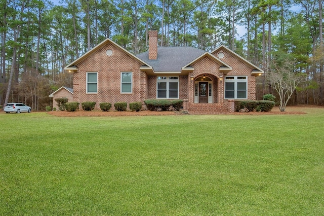 ranch-style home featuring a front yard