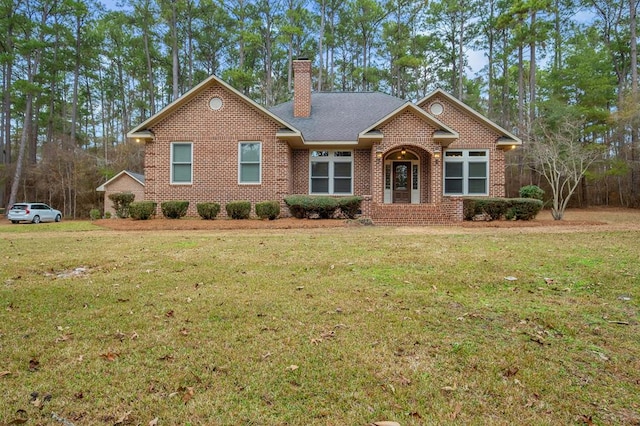 ranch-style home with a front lawn