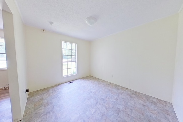 452 Bn Railroad Cir, Boston, GA 31626 - unfurnished room featuring light flooring and a textured ceiling