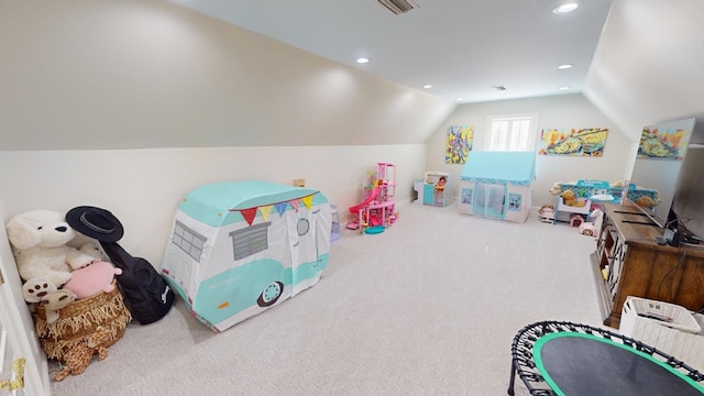 game room featuring lofted ceiling and carpet