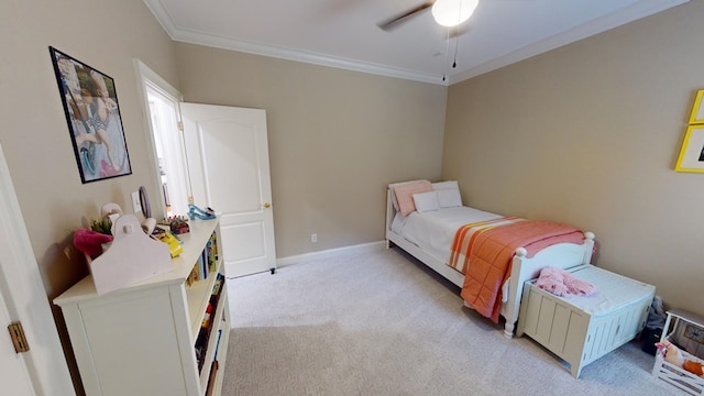 bedroom with ornamental molding, light colored carpet, and ceiling fan