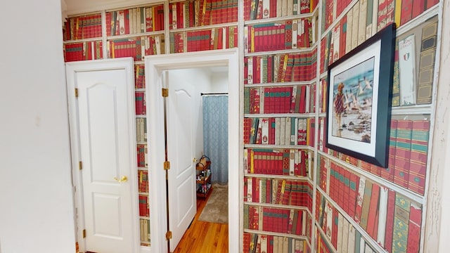 corridor featuring wood-type flooring