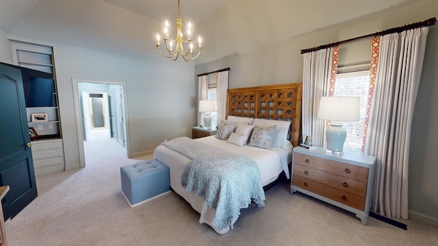 bedroom featuring light colored carpet and a notable chandelier