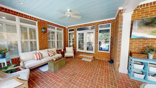 view of patio with outdoor lounge area, ceiling fan, and french doors