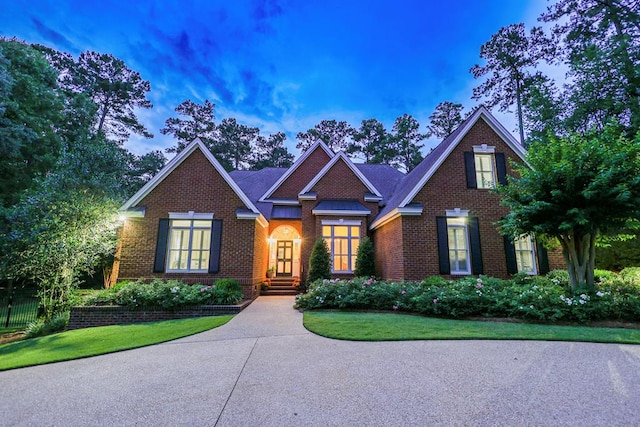 312 Avalon Way, Thomasville, GA 31792 - view of front facade featuring brick siding and a front lawn