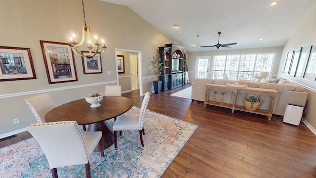 dining room featuring baseboards, recessed lighting, ceiling fan with notable chandelier, wood finished floors, and a textured ceiling