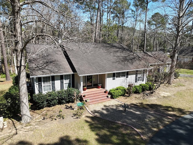 ranch-style home featuring covered porch