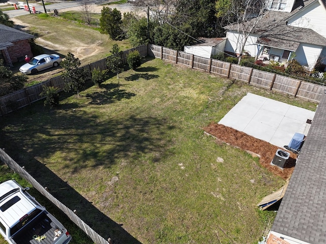 view of yard with a patio area and a fenced backyard