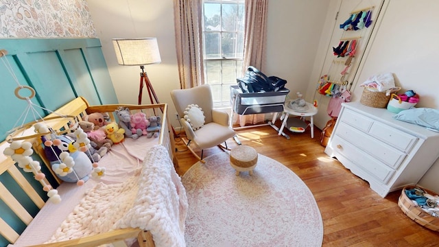 bedroom featuring wood finished floors