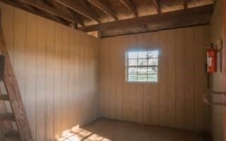 interior space featuring wood walls