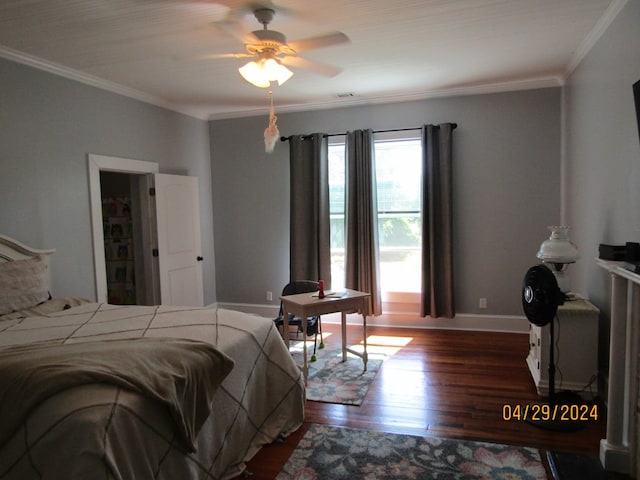 bedroom featuring crown molding, ceiling fan, and dark hardwood / wood-style floors