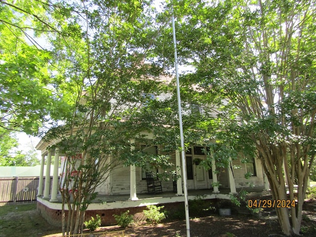 view of home's exterior with a porch