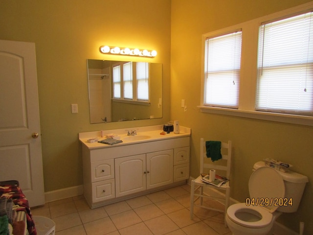 bathroom with vanity and tile patterned flooring