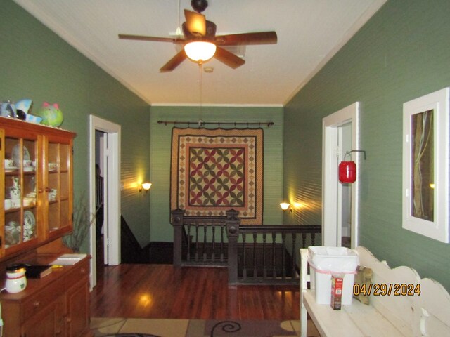 interior space featuring dark wood-type flooring and ceiling fan