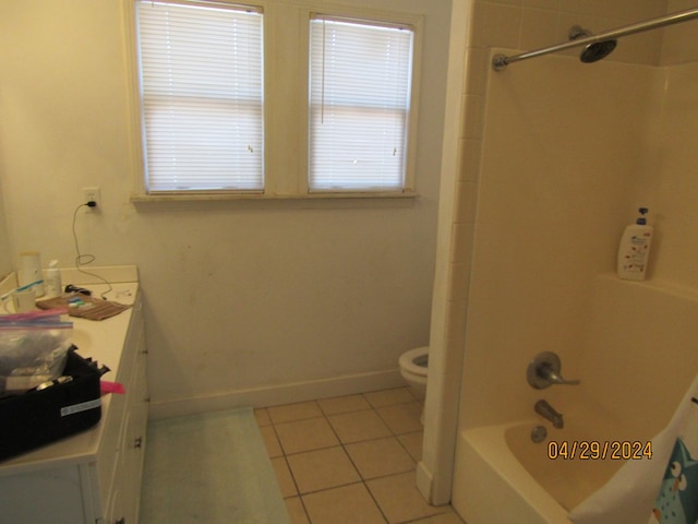 full bathroom with  shower combination, toilet, tile patterned flooring, and vanity