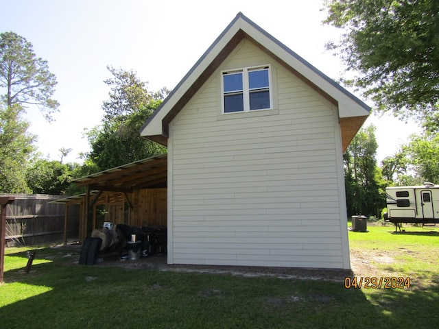 view of home's exterior featuring a lawn