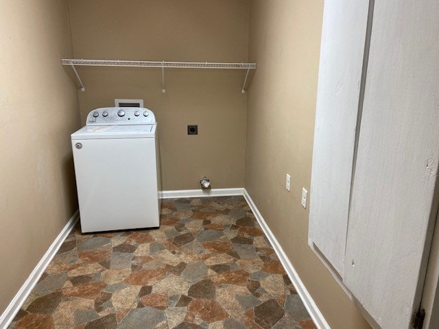 washroom with washer / dryer