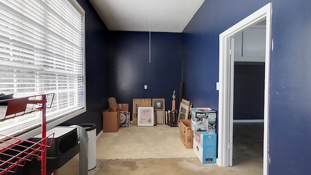 interior space featuring concrete floors