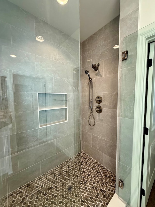 bathroom featuring walk in shower