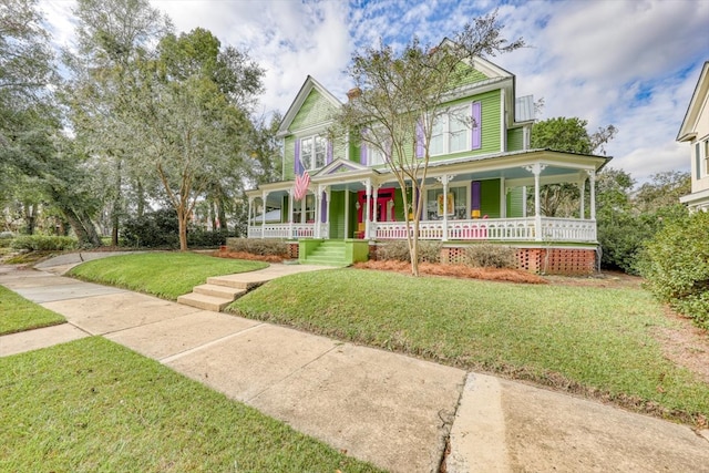 view of front facade featuring a porch and a front yard