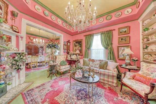 living room featuring a raised ceiling, ornamental molding, and a chandelier